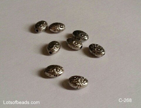 Fancy floral oval heavy bead